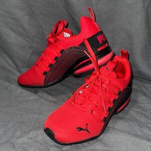 Puma children’s Red and Black Sneakers